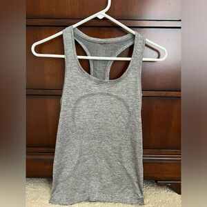 Lululemon swiftly tech tank in gray.  Size 4